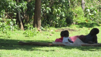 Photo of reclining children.