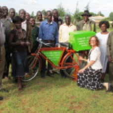 Library Committee with bicycle donated to them by Maria's Libraries.