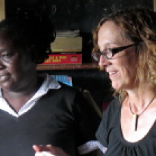 Librarian and teacher Rosemary Imbayi and me in the classroom/library.